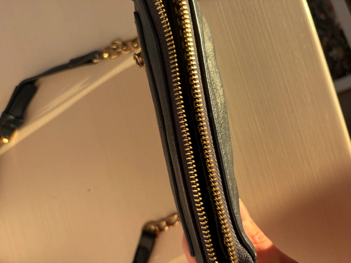 Black clutch with gold hardware and chain strap - photo 4