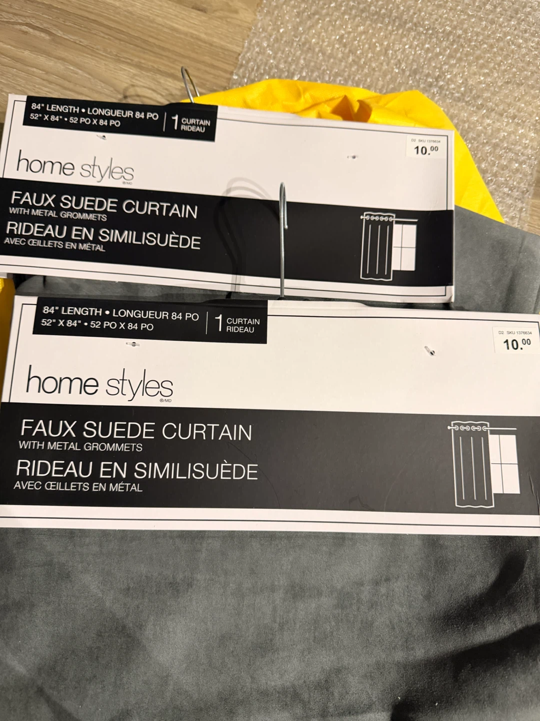 2 Brand new curtains and adjustable metal rod