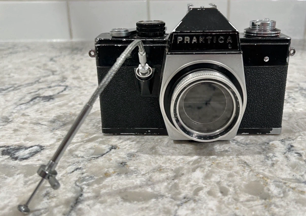 Praktica L 35mm Film Camera Body w/ Step-Up Ring, Filter