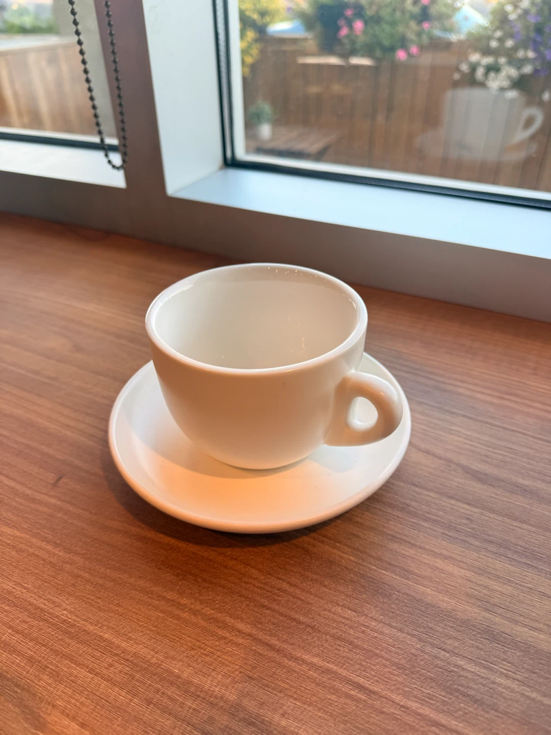 White Ceramic Coffee Cup and Saucer Set