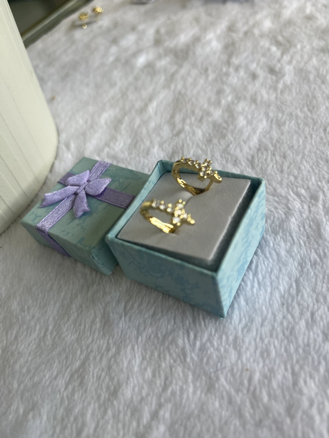 Gold-tone earrings with rhinestone cross detail - photo 2