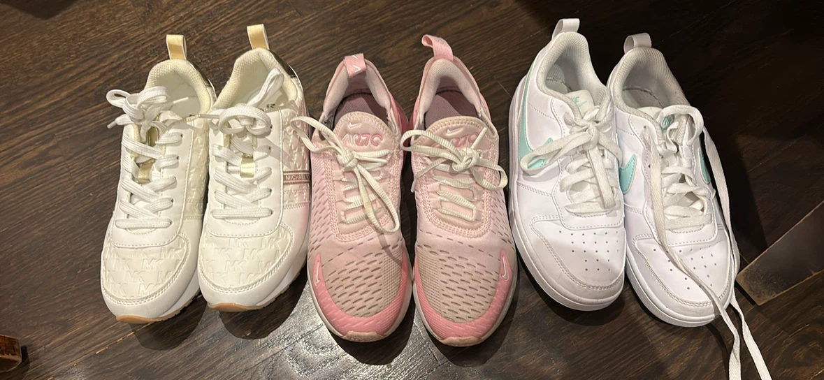 Bundle of Michael Kors, Nike Air Max 270, and Nike sneakers