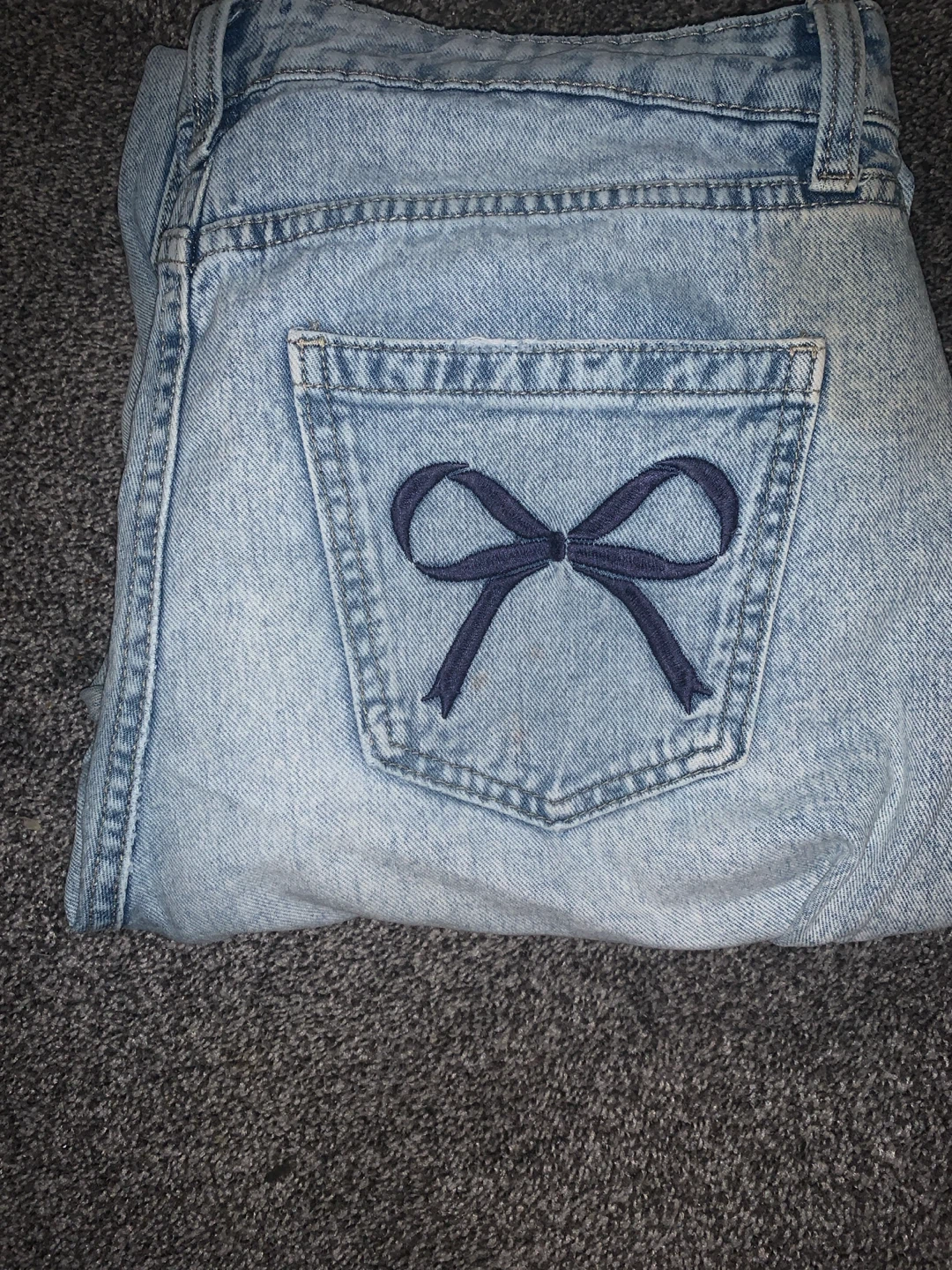 Light Wash Denim Jeans with Bow Pockets