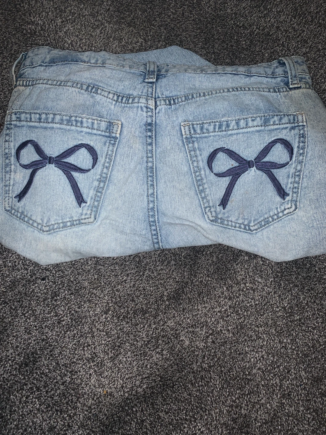 Light Wash Denim Jeans with Bow Pockets - photo 2