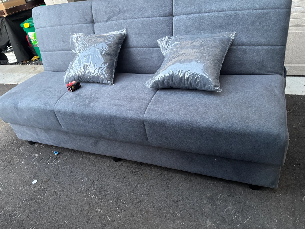 Grey Sofa Bed with Pillows