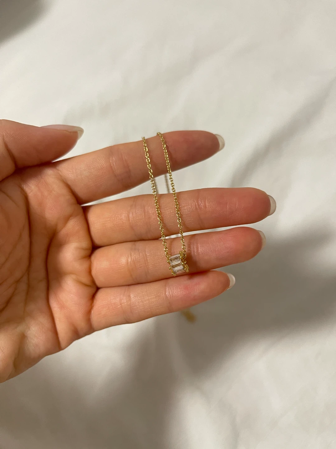 Gold-tone necklace with clear baguette crystal pendant - photo 2
