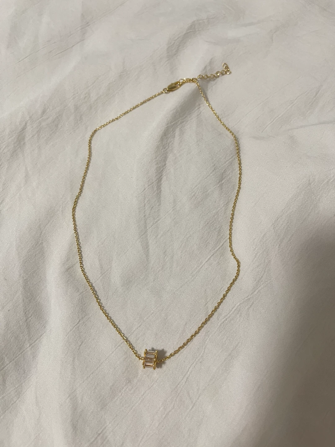 Gold-tone necklace with clear baguette crystal pendant - photo 3