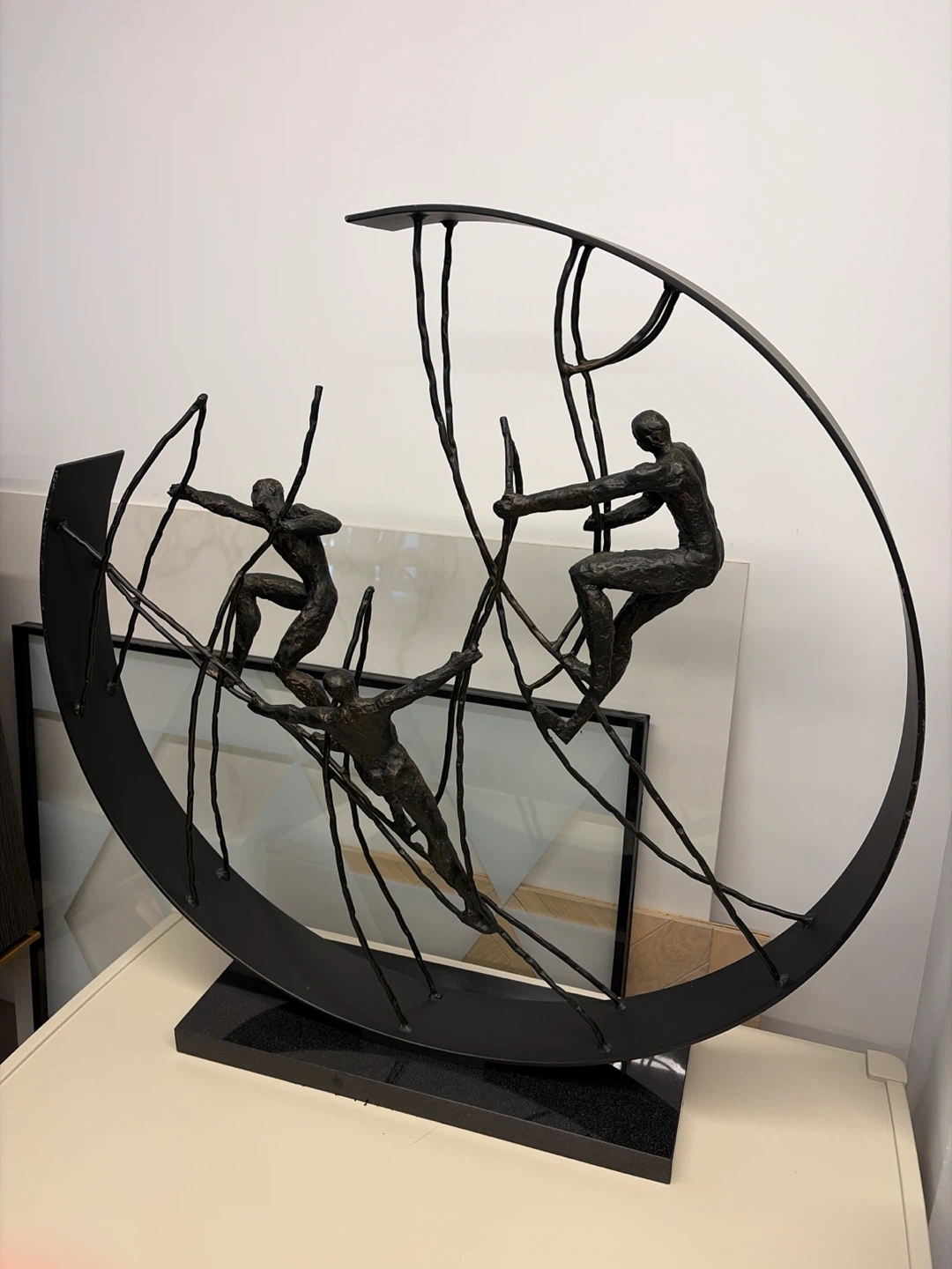 Abstract Metal Sculpture of Figures in Motion