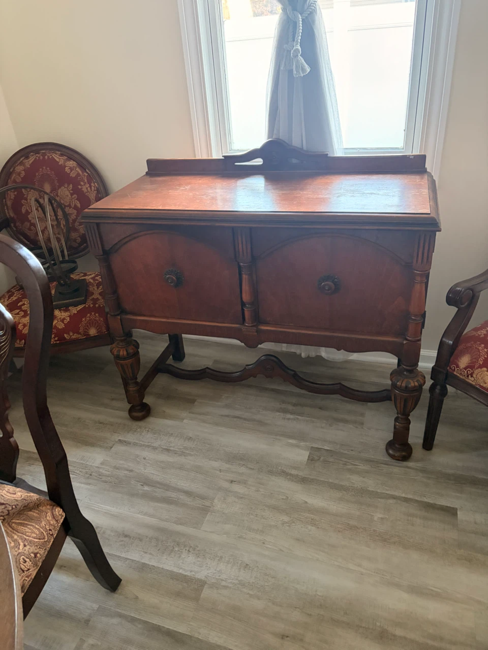 Antique Wooden Cabinet with Carved Details