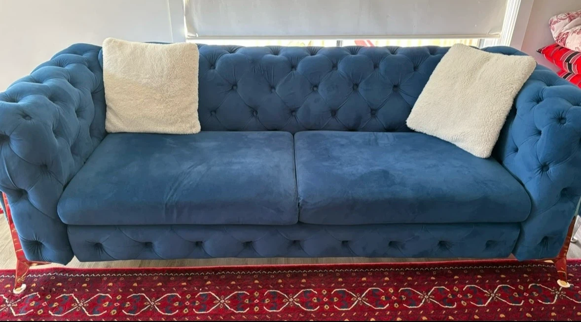 Blue Velvet Tufted Sofa with Cream Cushions