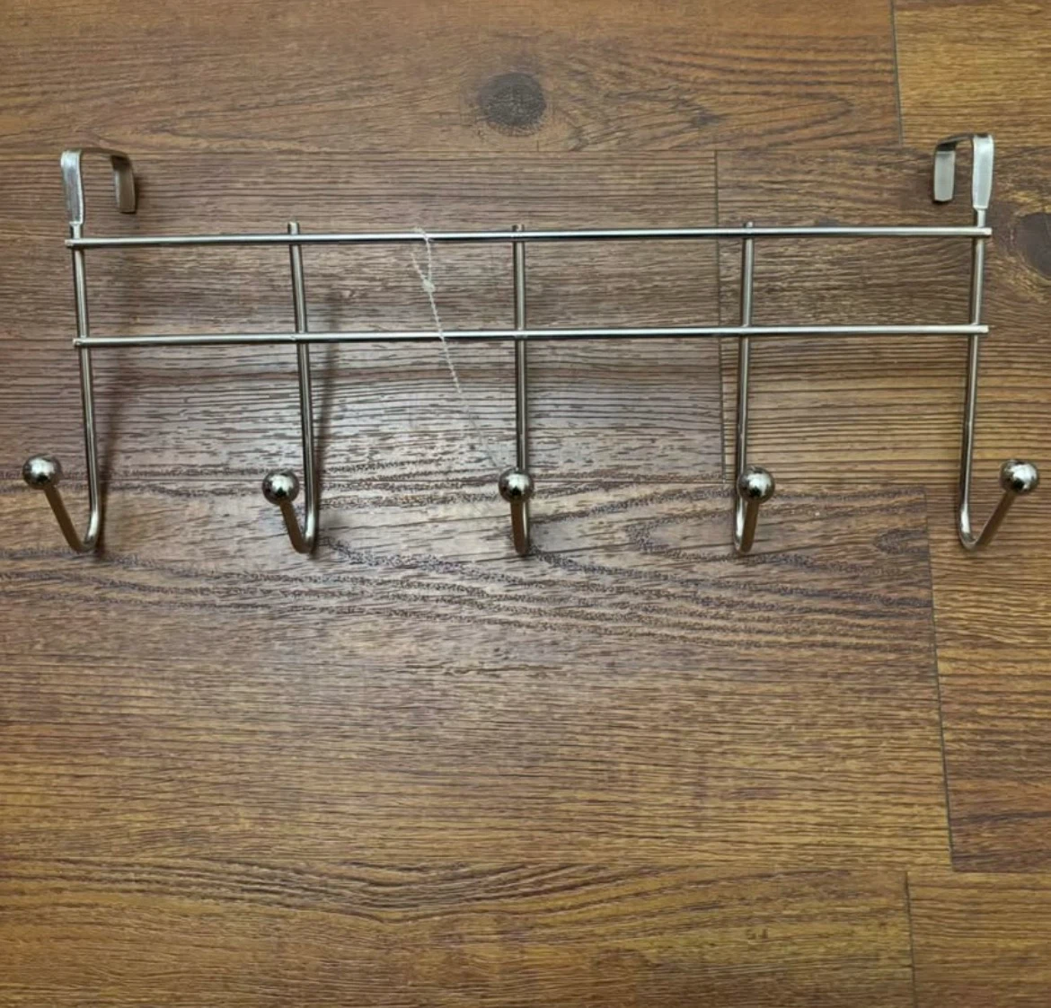White metal shower caddy and silver over-the-door hook rack - photo 2