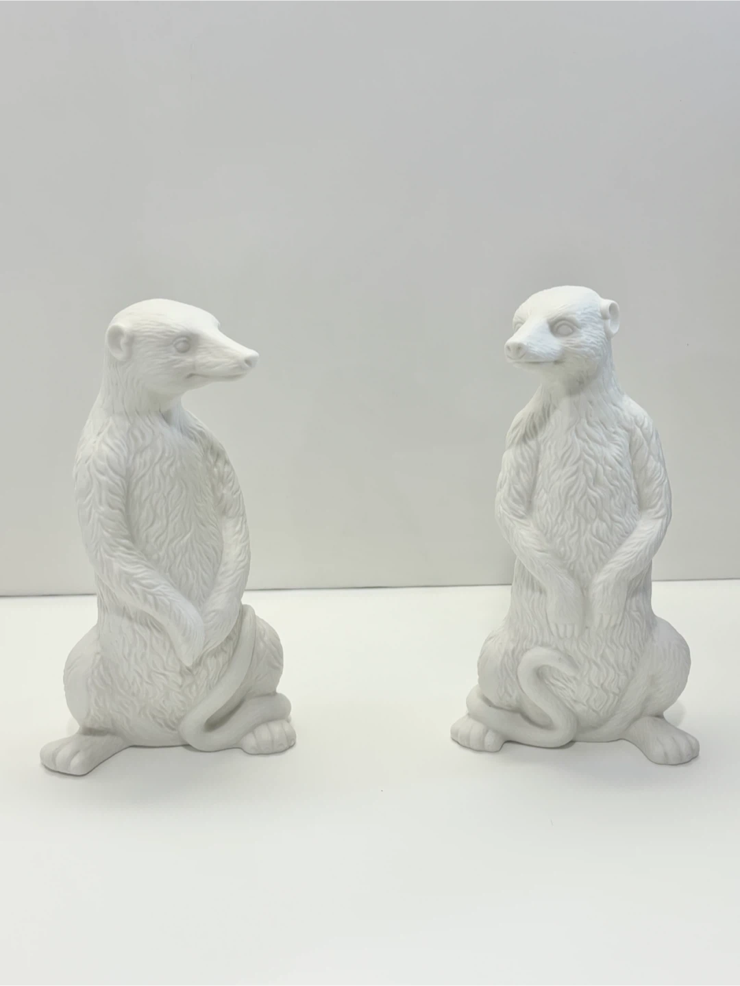 Pair of Luna Porcelain Meerkat Figurines