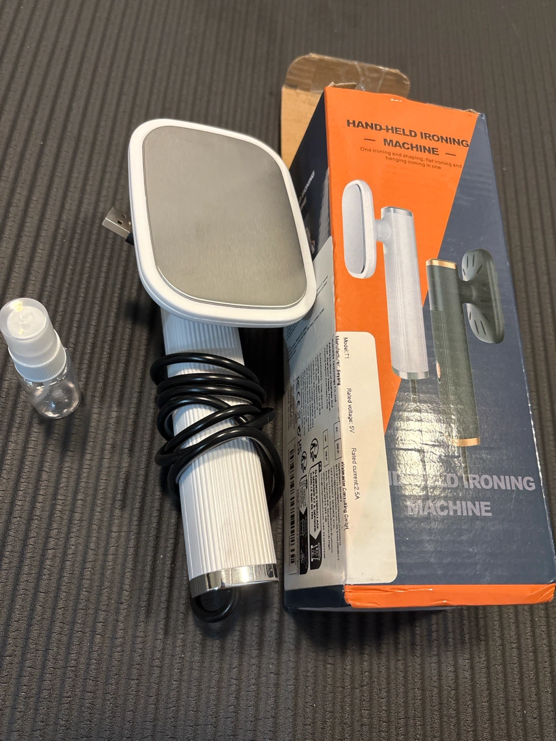 Hand-Held Ironing Machine