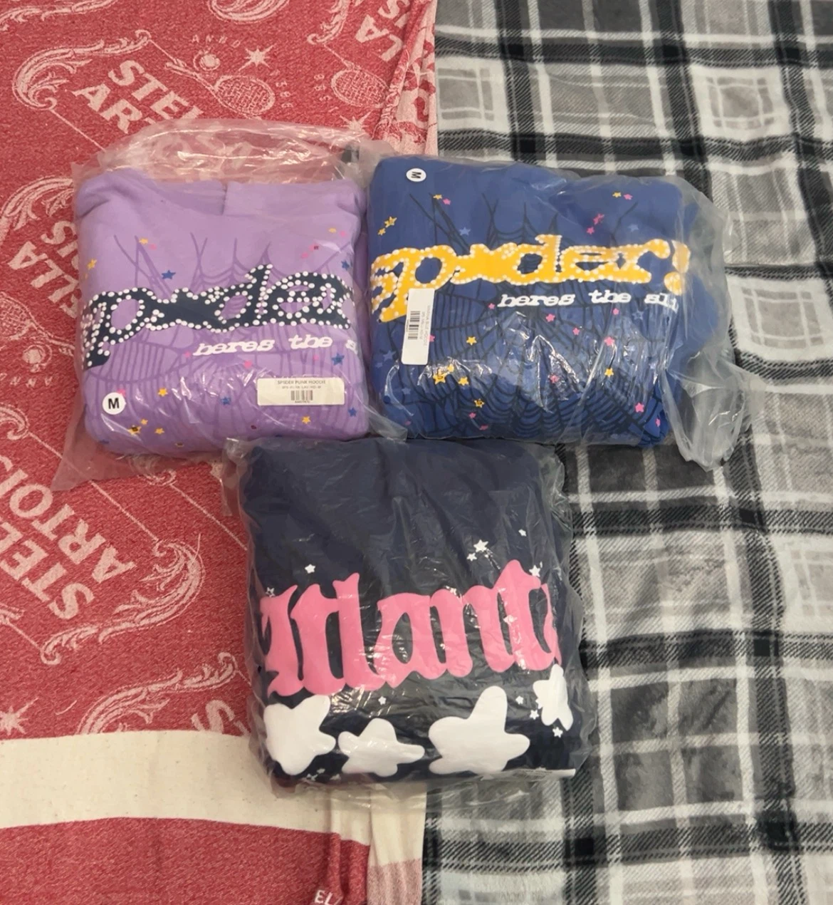 Four Sp5der hoodies