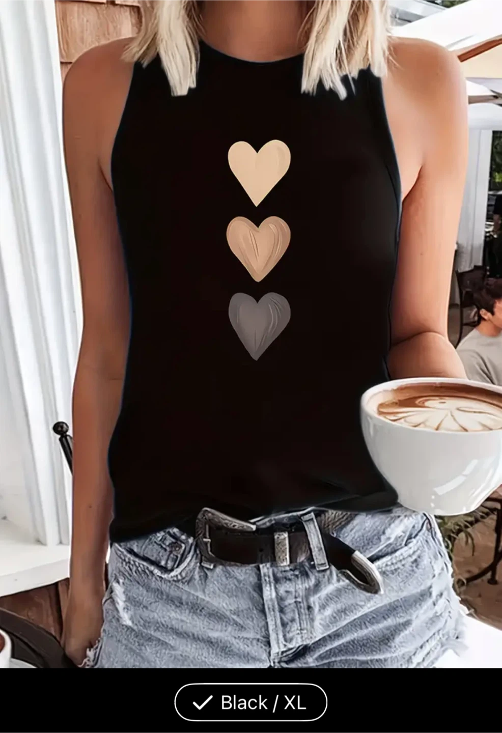 Black sleeveless top with heart print