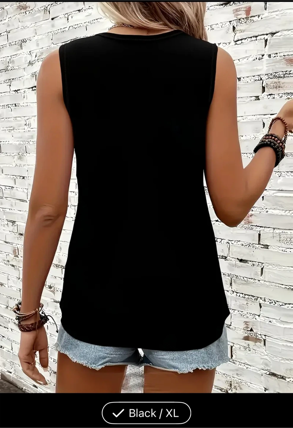 Black sleeveless top with heart print - photo 2
