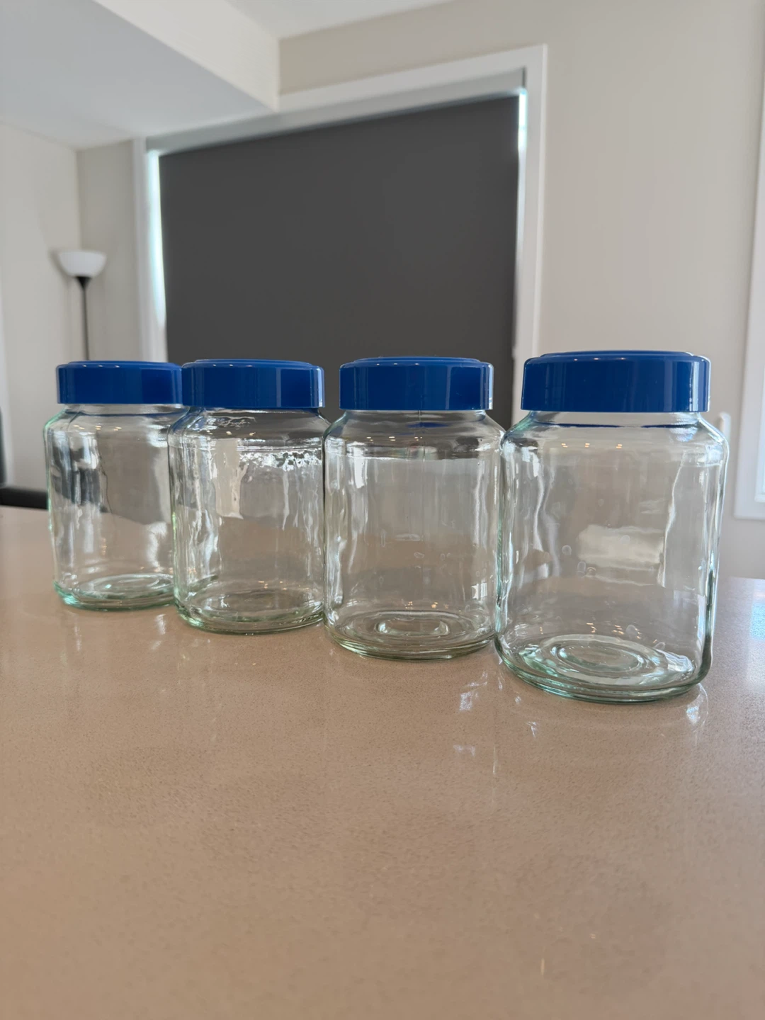 Set of 4 Clear Glass Jars (200 g) with Blue Lids