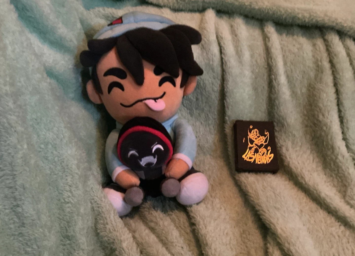 Skeppy holding BBH Youtooz