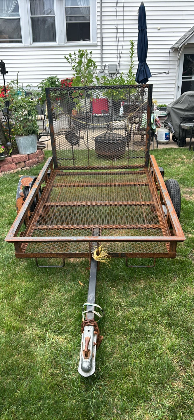 Utility Trailer with Foldable Ramp
