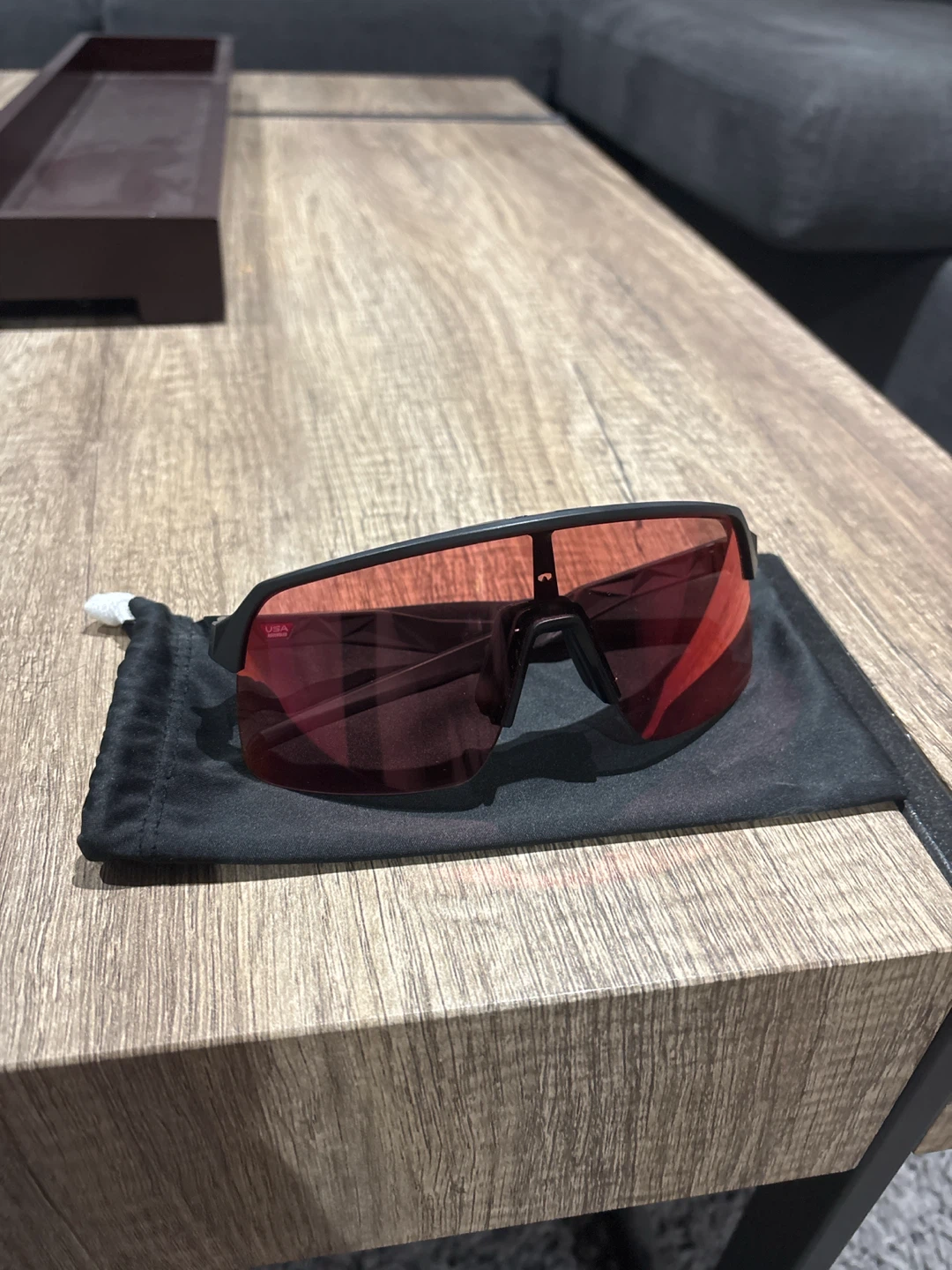 Oakley Sunglasses with Red Lenses and Black Frame