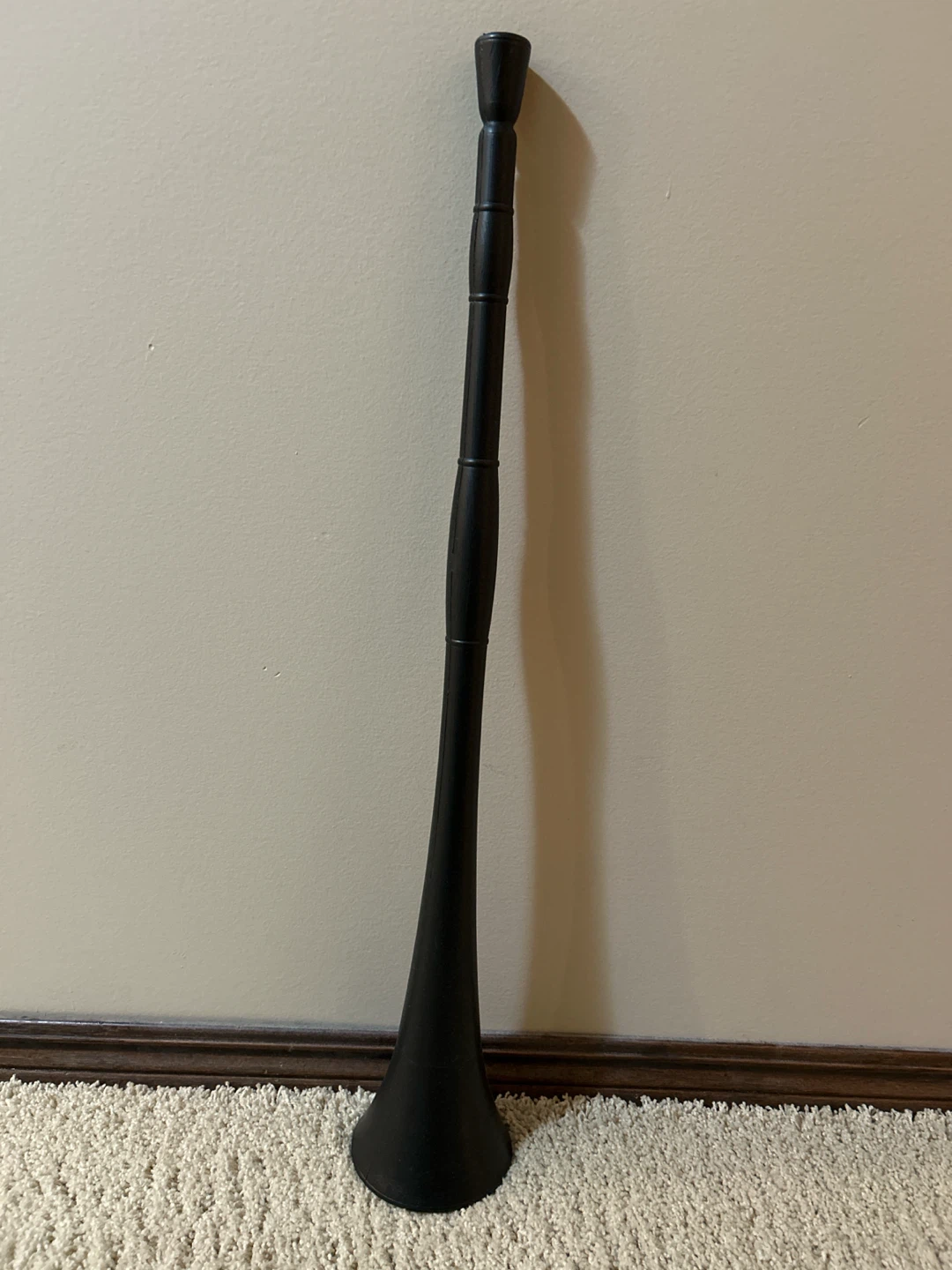 Plastic noise-maker horn