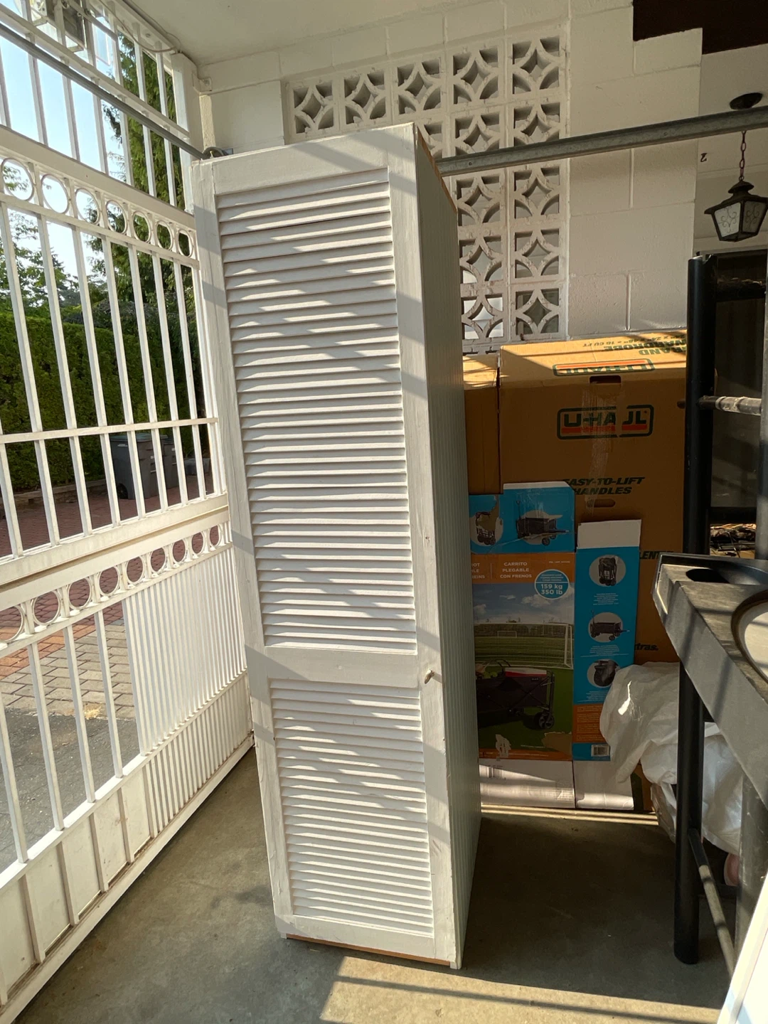 2 White Storage Cabinets with baskets $50 each or both for $80