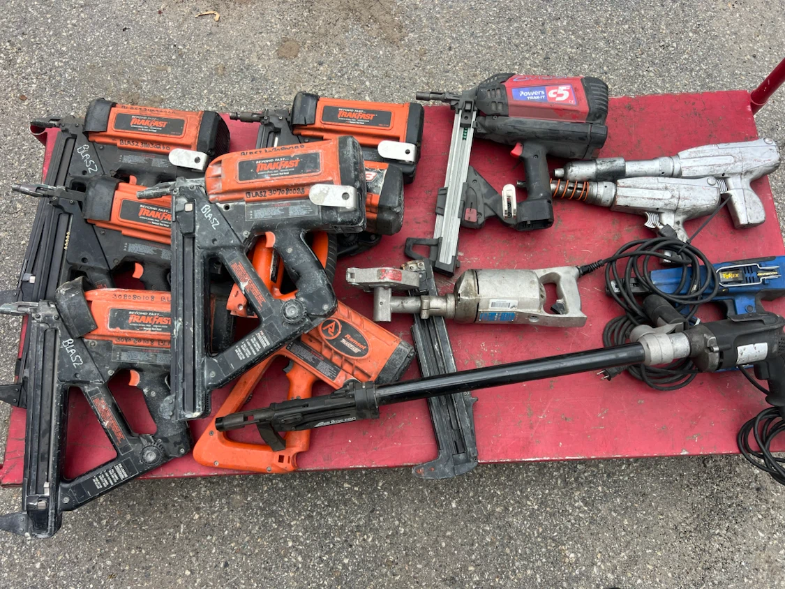 Assorted Pneumatic Nail Guns and Tools