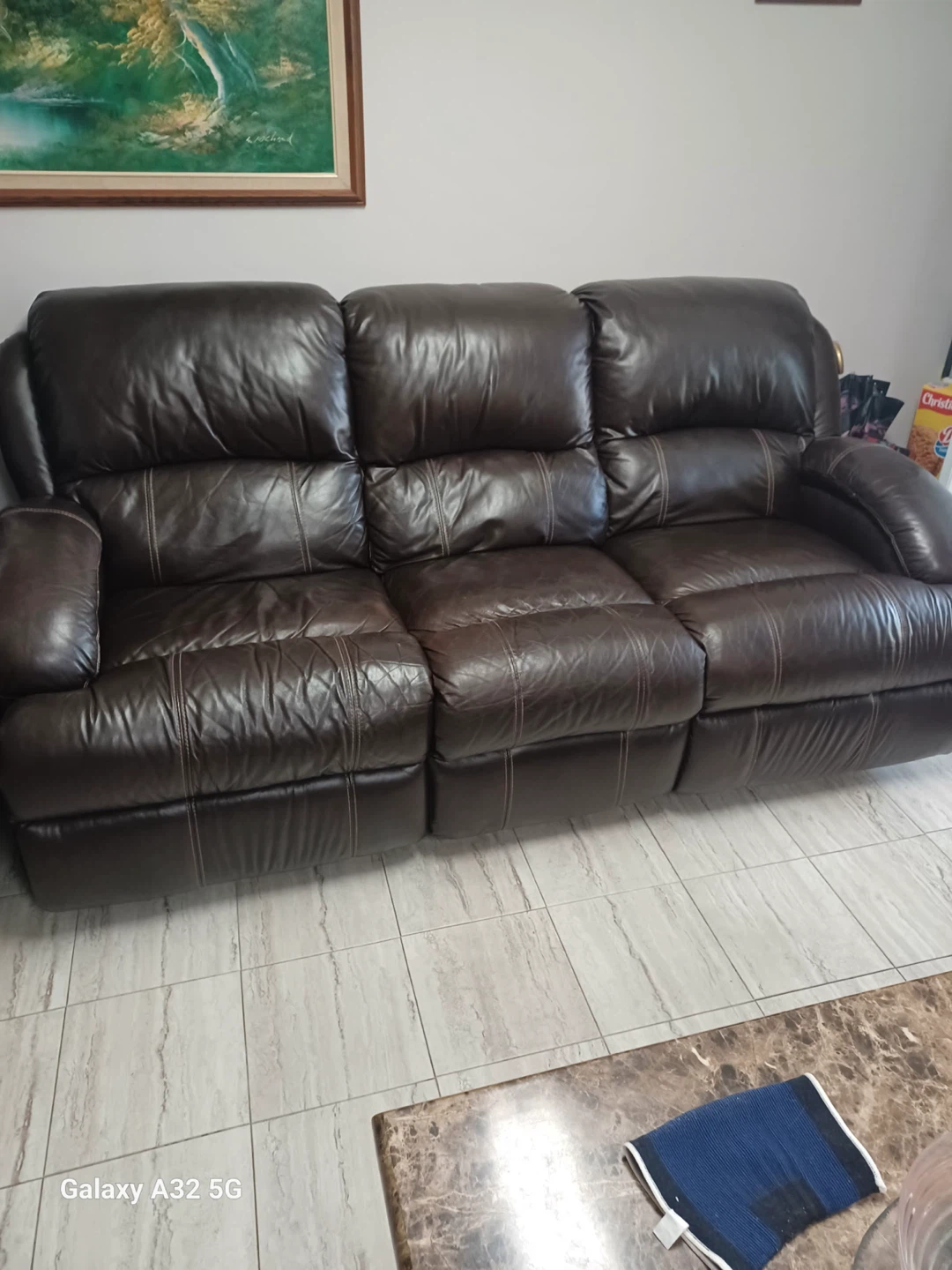 Brown Leather Reclining Sofa
