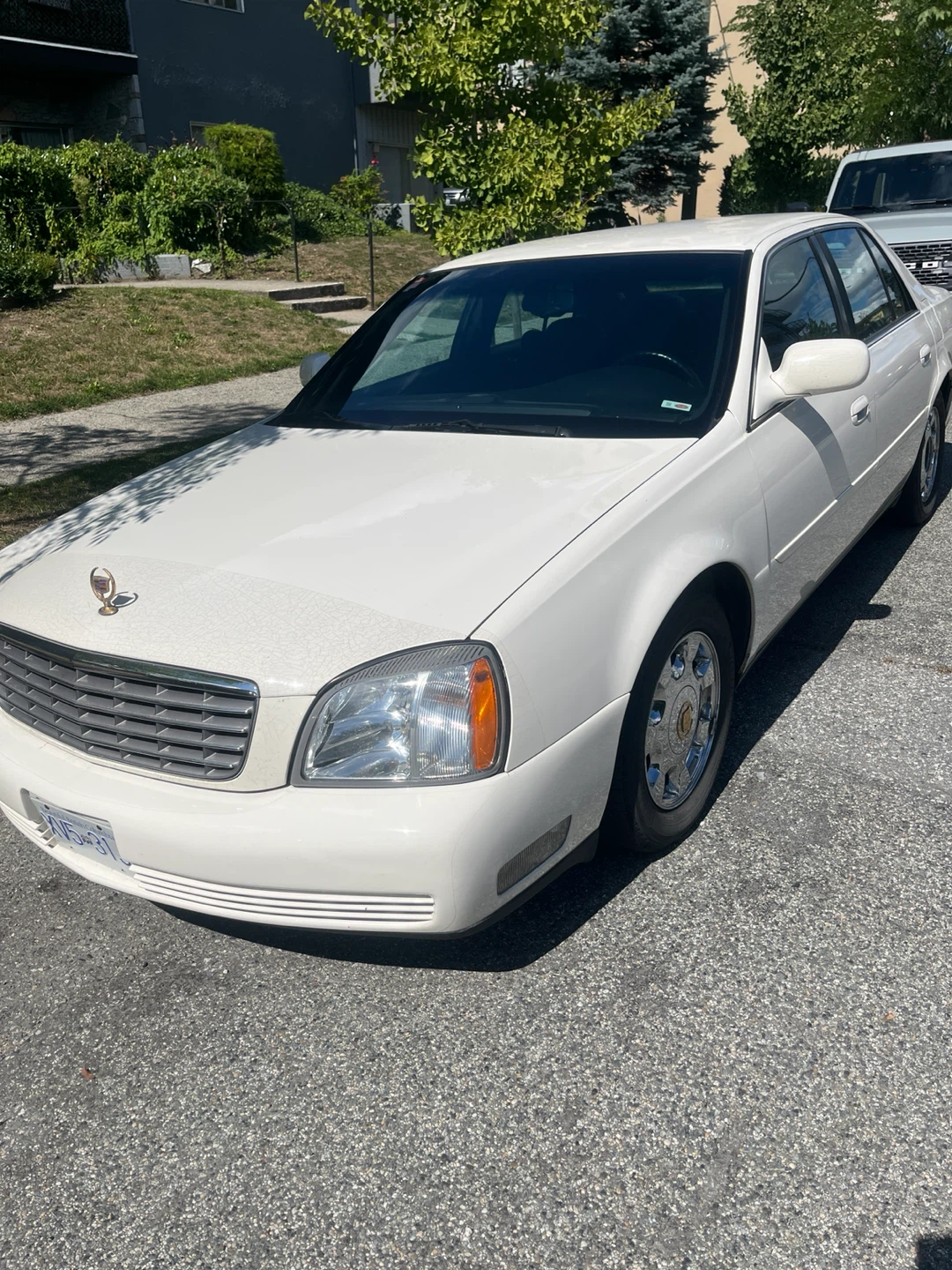 White Cadillac DeVille Sedan