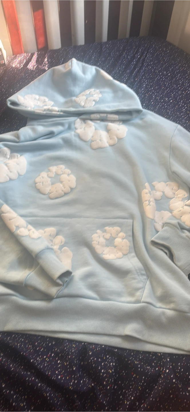 Light blue denim tears