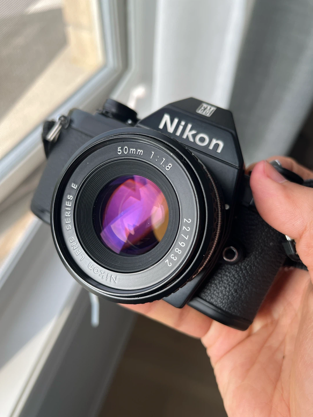 Nikon EM 35mm Film Camera with 50mm 1:1.8 Lens