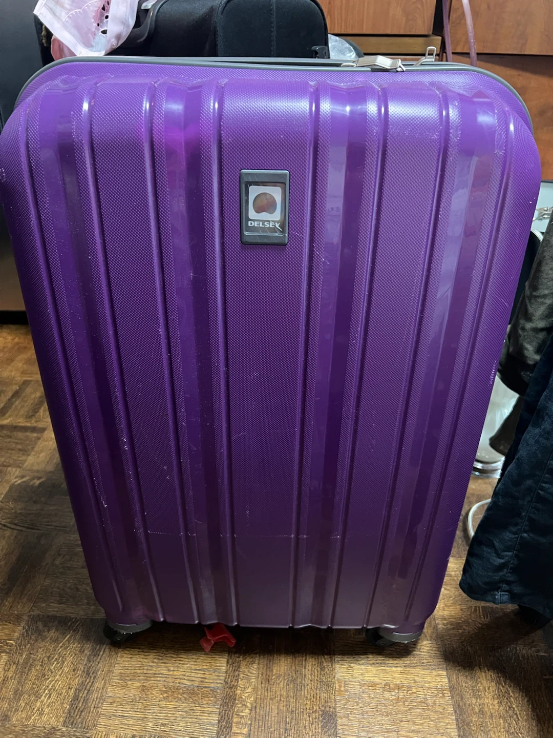 Purple Delsey Hardside Spinner Suitcase