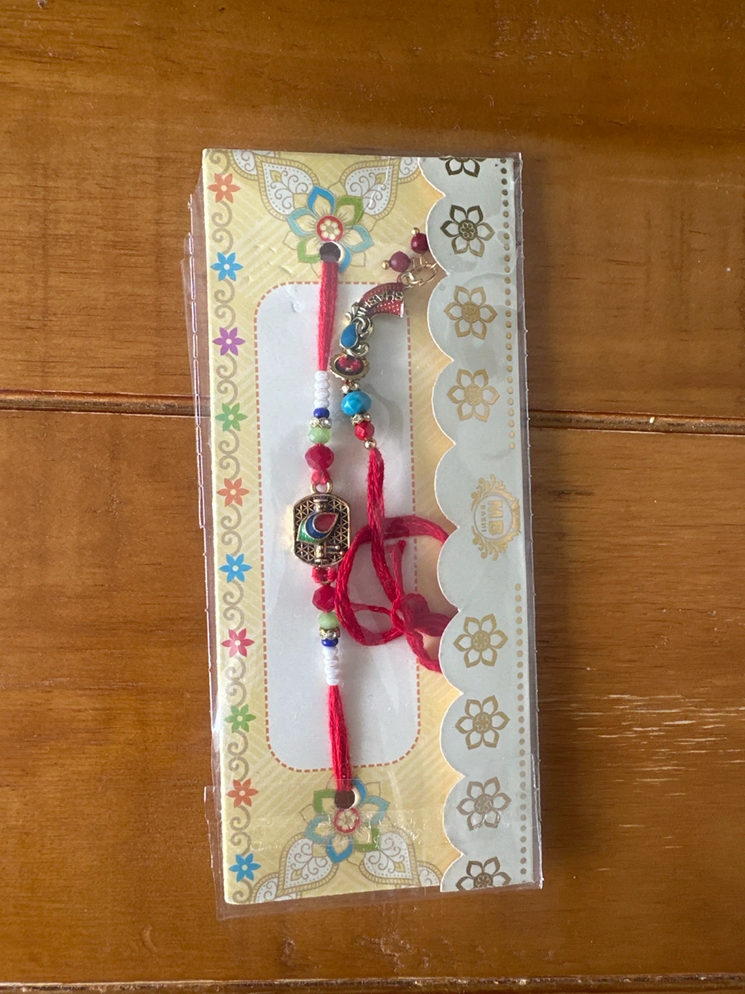 Rakhi Bracelet with Peacock Charm and bhabhi rakhi