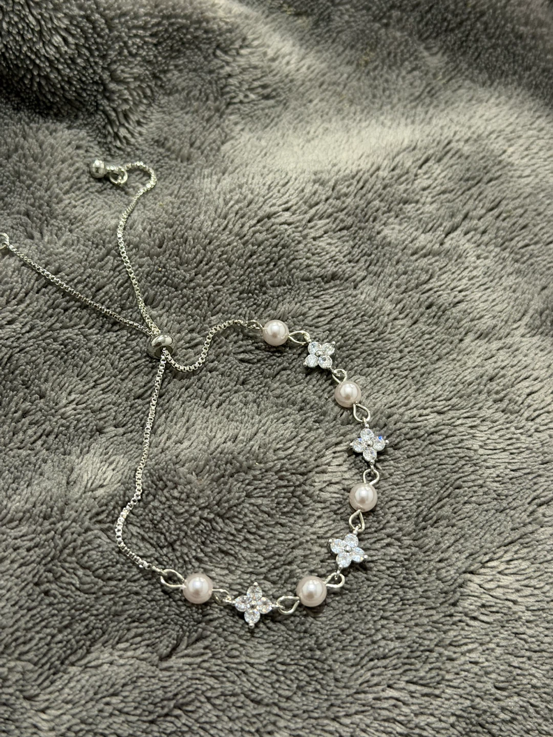 Silver-tone bracelet with pearls and butterfly charms