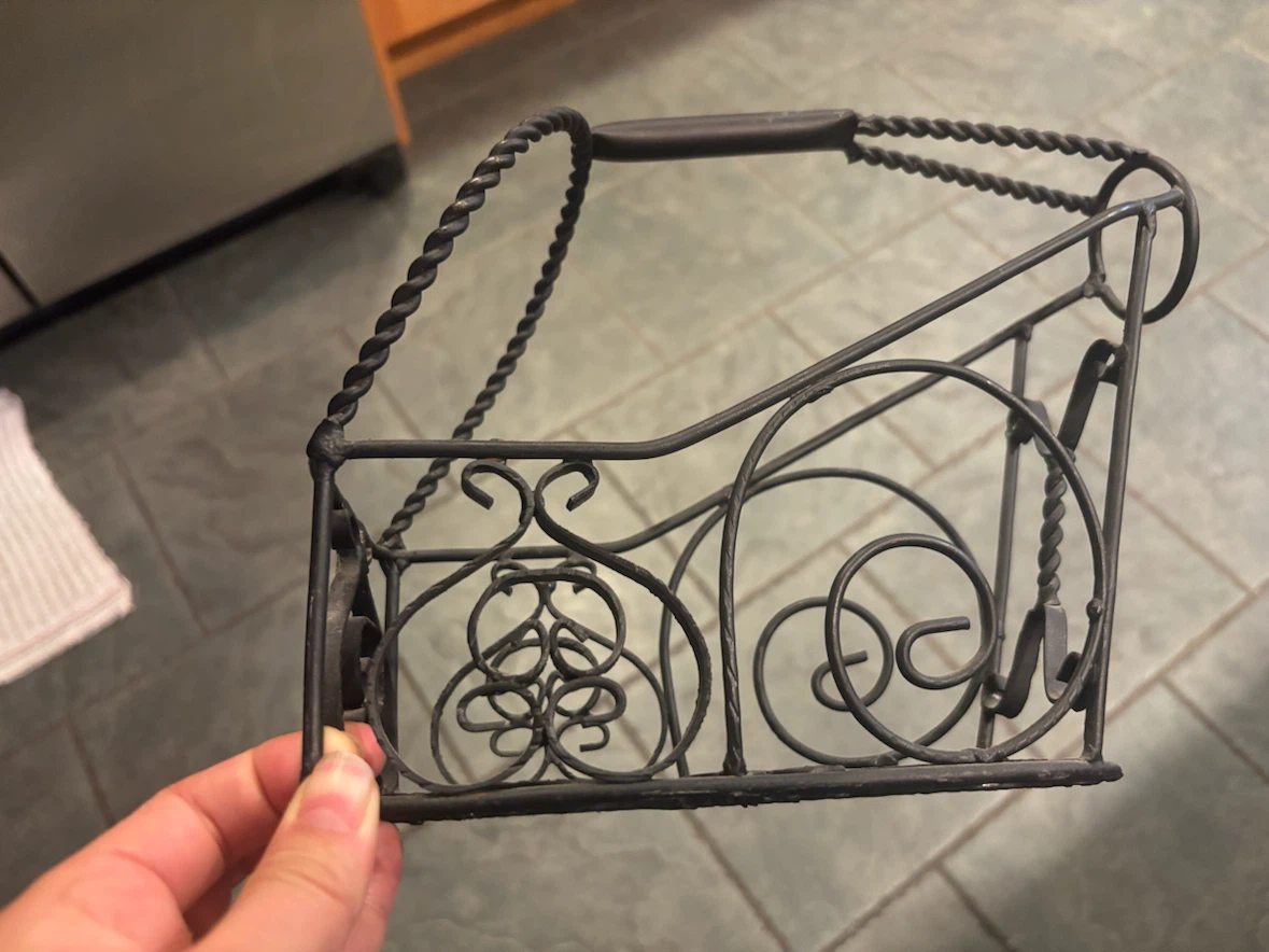 Wrought iron wine bottle caddy