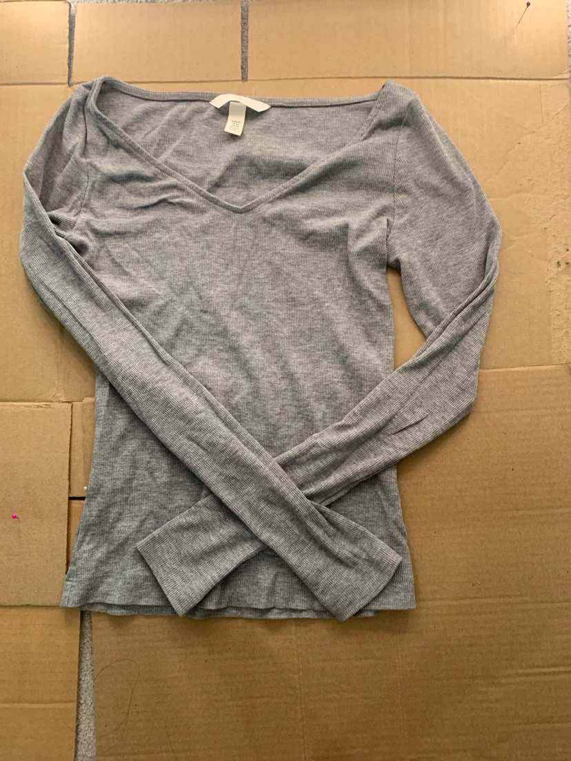 grey long sleeve top