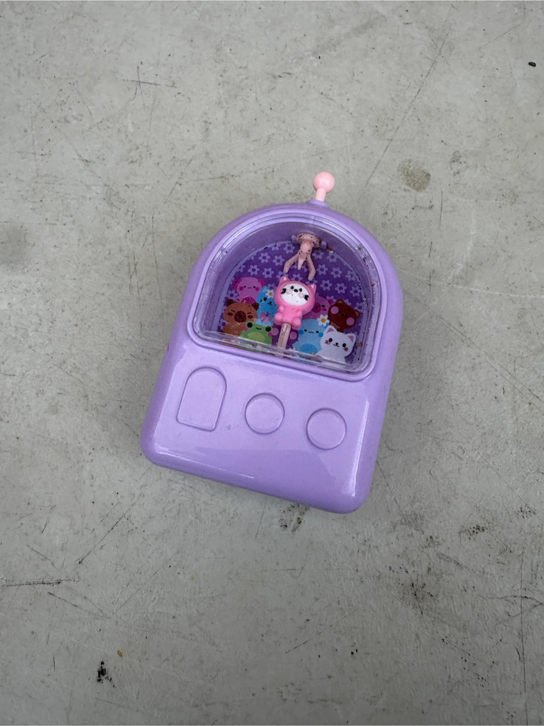 Purple Toy Dispenser with Mini Figurines