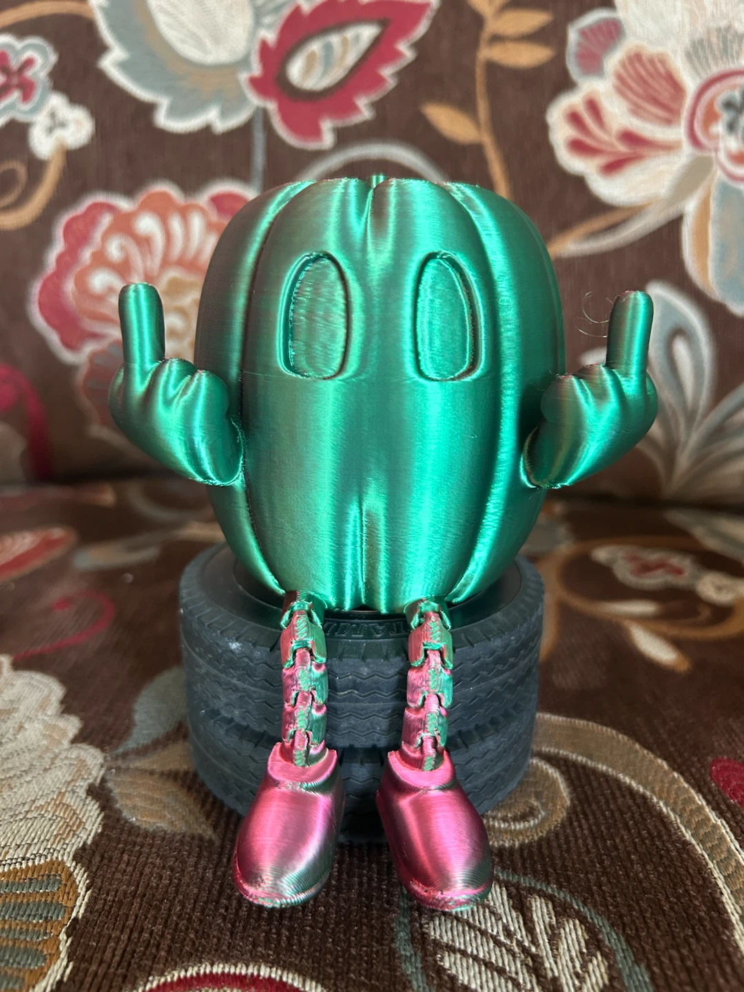 3D Printed Green Pumpkin Character with Tire Base