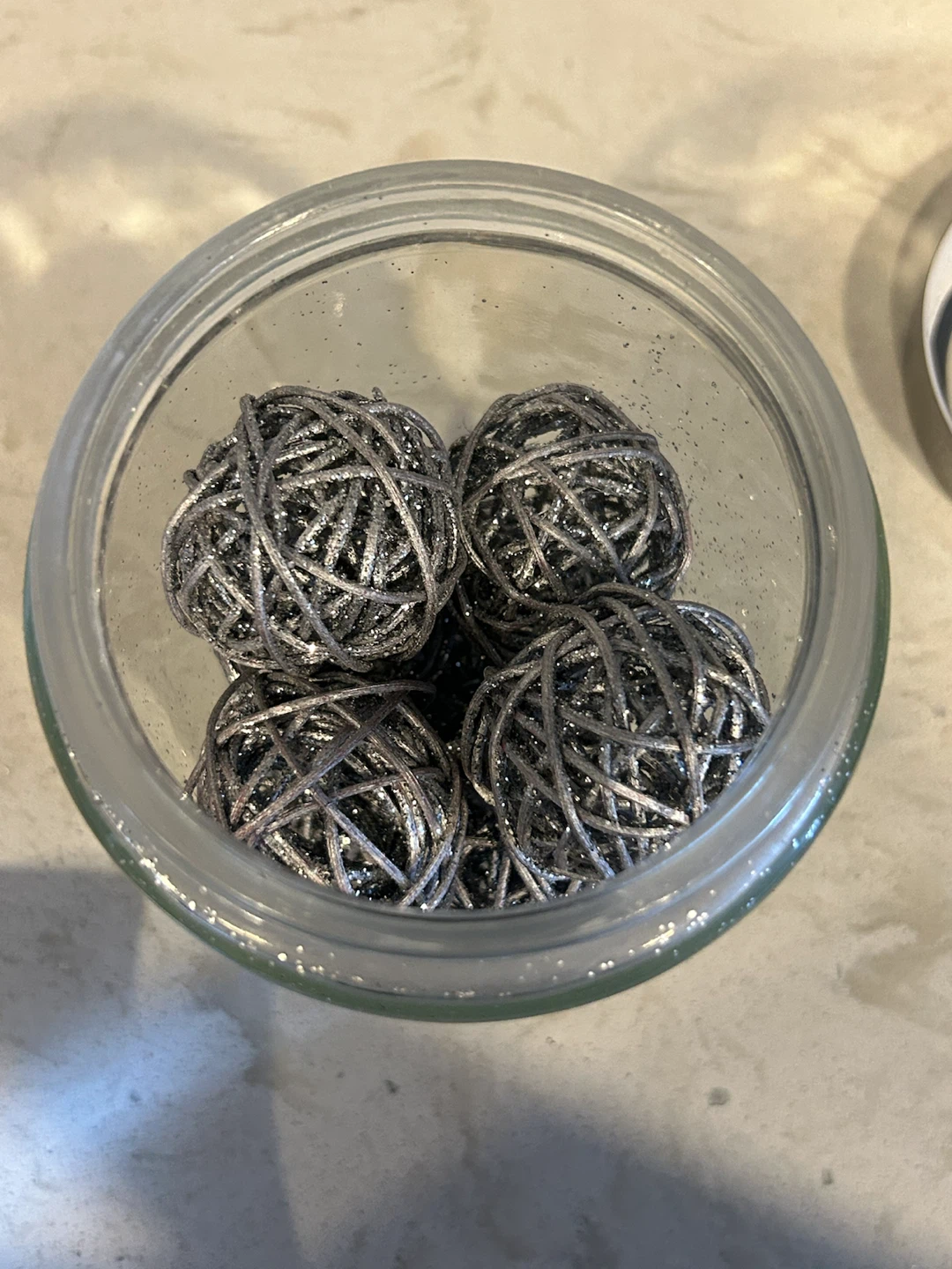 Decorative sparkly orbs in bowl and glass jar - photo 4