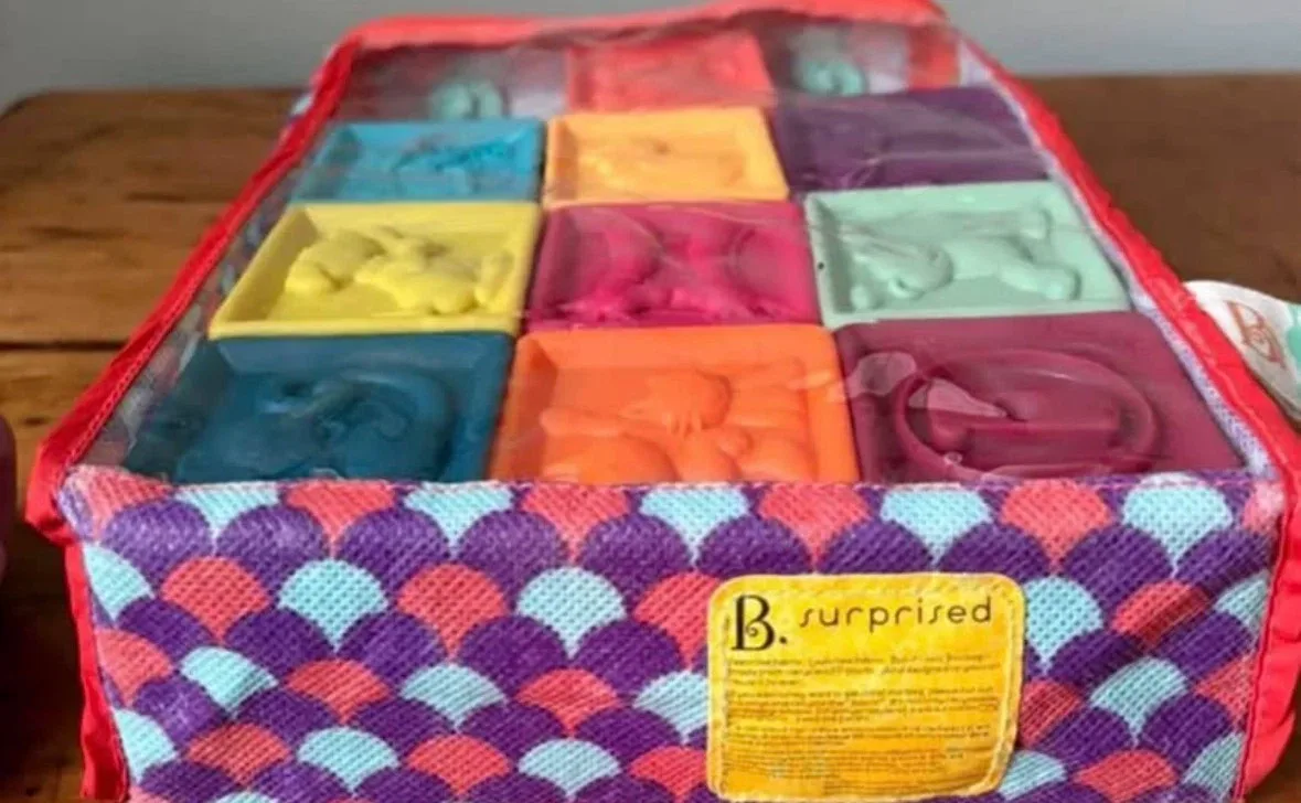 B. surprised baby blocks with bag