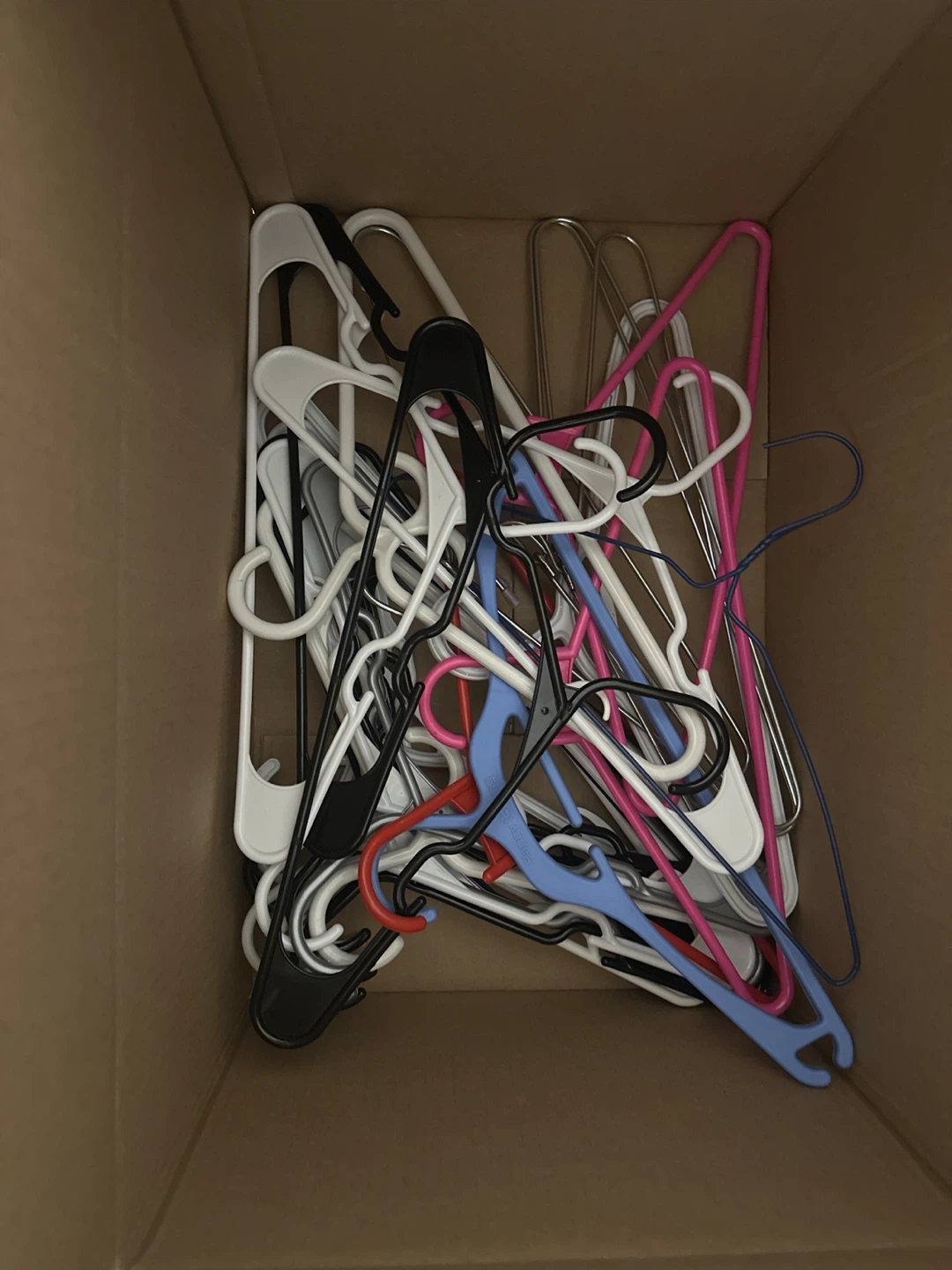 Mixed Lot of Plastic and Metal Hangers
