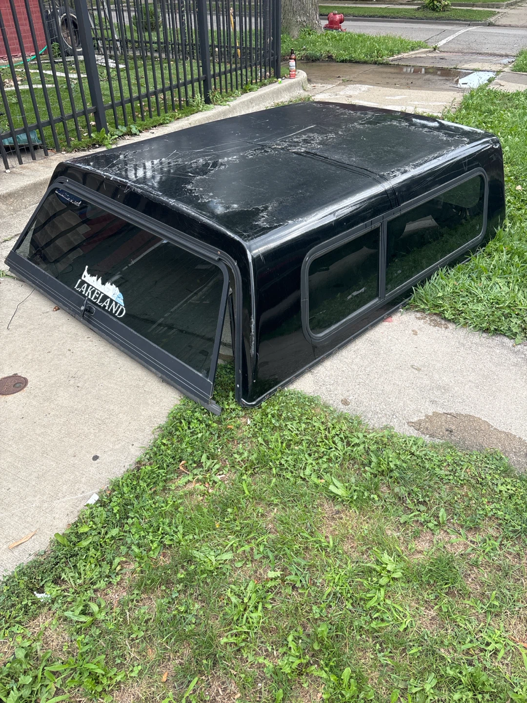 Black Truck Bed Cap with Lakeland Sticker