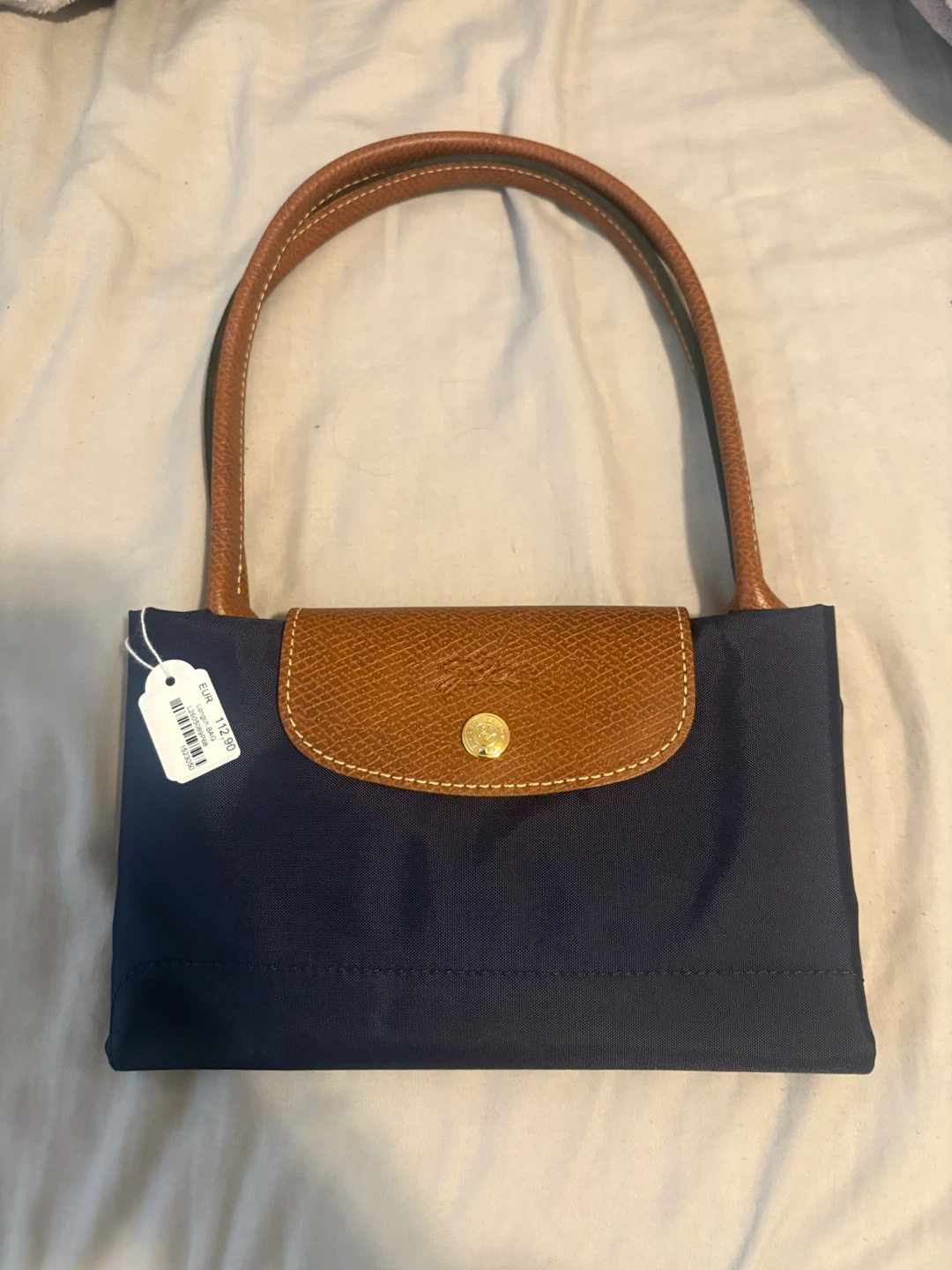 Longchamp bag, still has the tag, brand new never used.