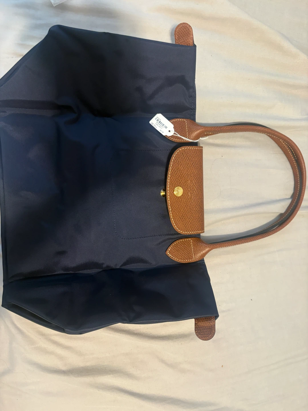 Longchamp bag, still has the tag, brand new never used. - photo 4