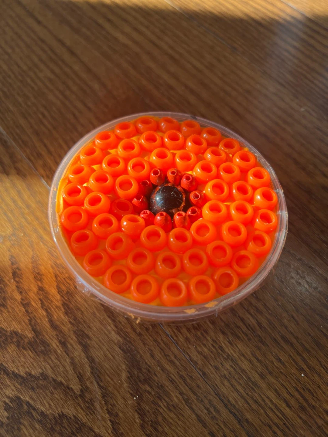 Orange butter slime beads on top