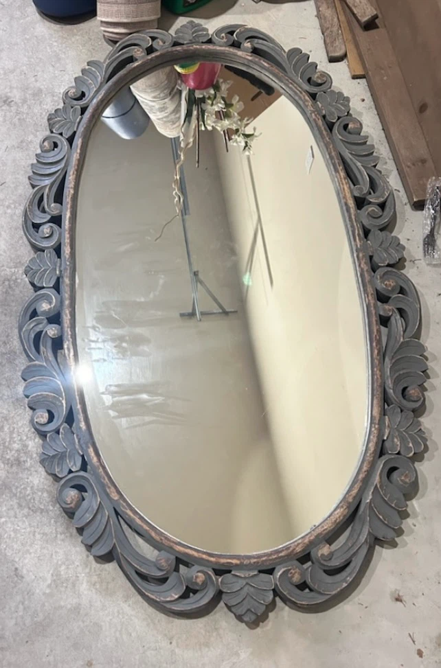 Ornate Oval Mirror with Decorative Frame