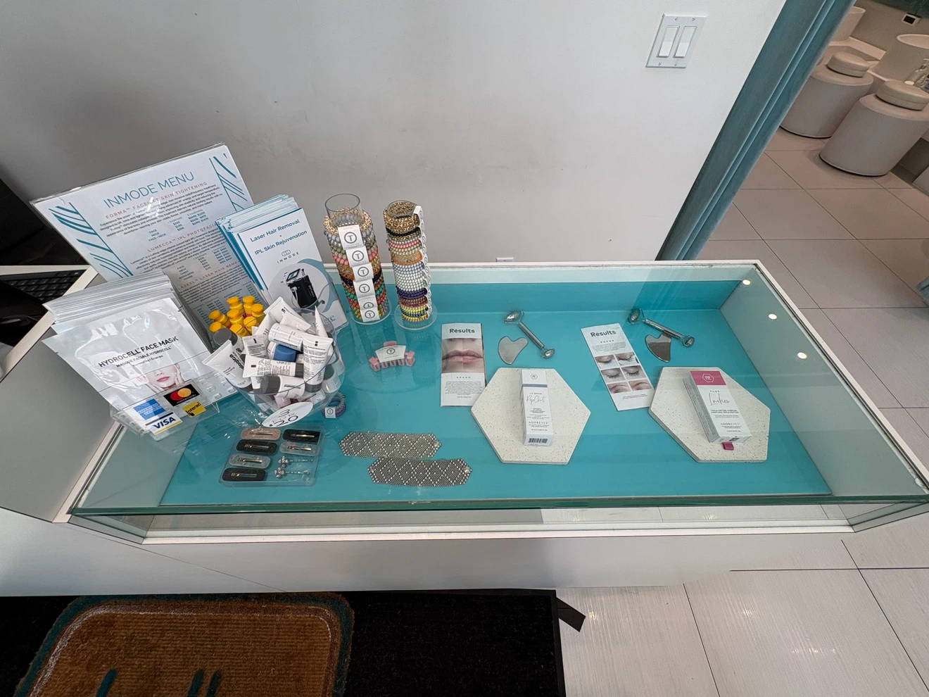 Reception Desk and Products Displayed - photo 2