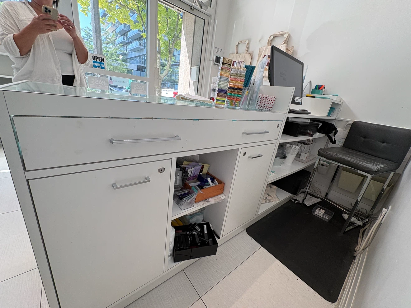 Reception Desk and Products Displayed - photo 4