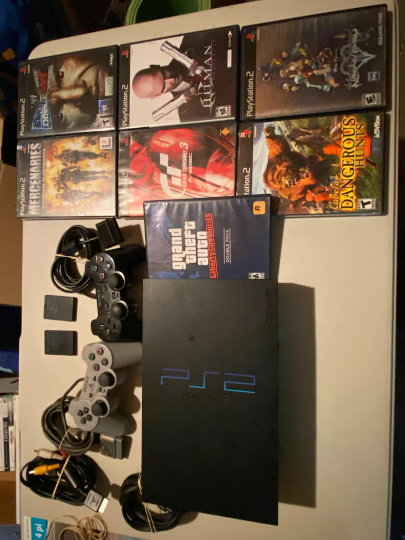 Sony PlayStation 2 Console Bundle with Games and Controllers