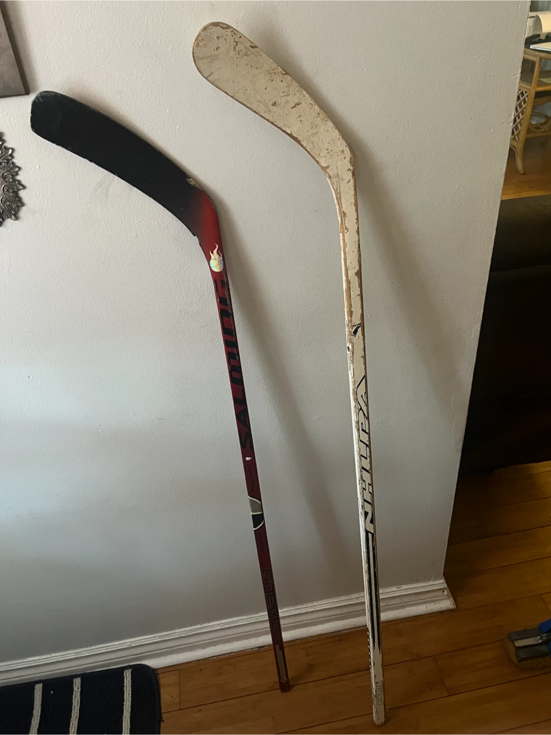 2 Hockey Sticks - One Warrior, One Bauer